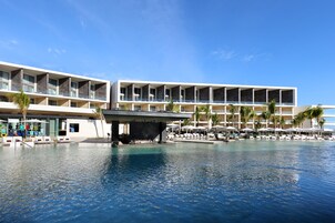 3 outdoor pools, open 8 AM to 8 PM, cabanas (surcharge), pool umbrellas