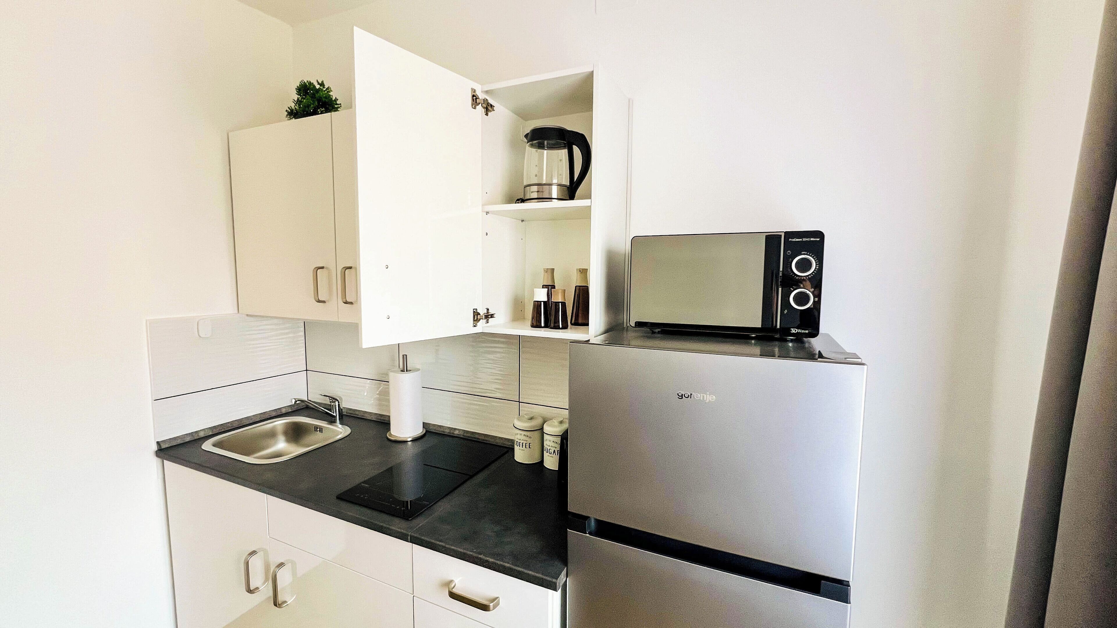 Comfort Apartment, 1 Bedroom | Private kitchen | Fridge, electric kettle