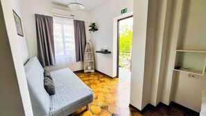 Comfort Apartment, 1 Bedroom | Living area | Flat-screen TV, Netflix, pay movies