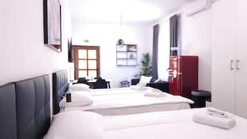 Superior Quadruple Room | Hypo-allergenic bedding, desk, laptop workspace, iron/ironing board