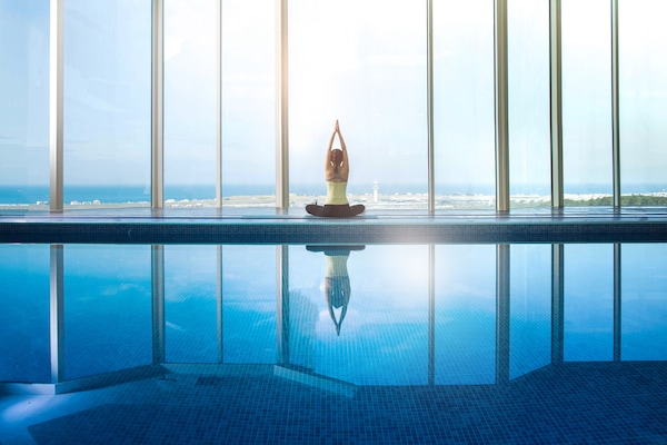 Indoor pool, open 7:00 AM to 9:00 PM, sun loungers
