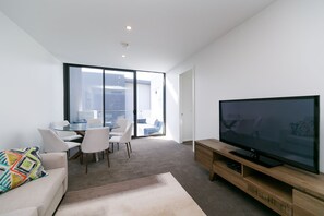 Apartment, 2 Bedrooms (Amaya 105) | Living area | Flat-screen TV, DVD player - Accommodate Canberra - Amaya (Griffith)