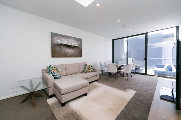 Apartment, 2 Bedrooms (Amaya 105) | Living area | Flat-screen TV, DVD player