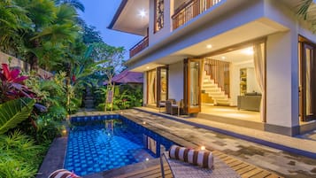 Family Villa (2 Bedrooms with Pool View) | Living area | LCD TV