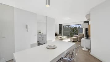 Comfort Apartment, 3 Bedrooms | Living area | Flat-screen TV