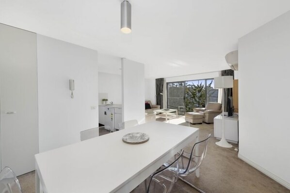 Comfort Apartment, 3 Bedrooms | Living area | Flat-screen TV