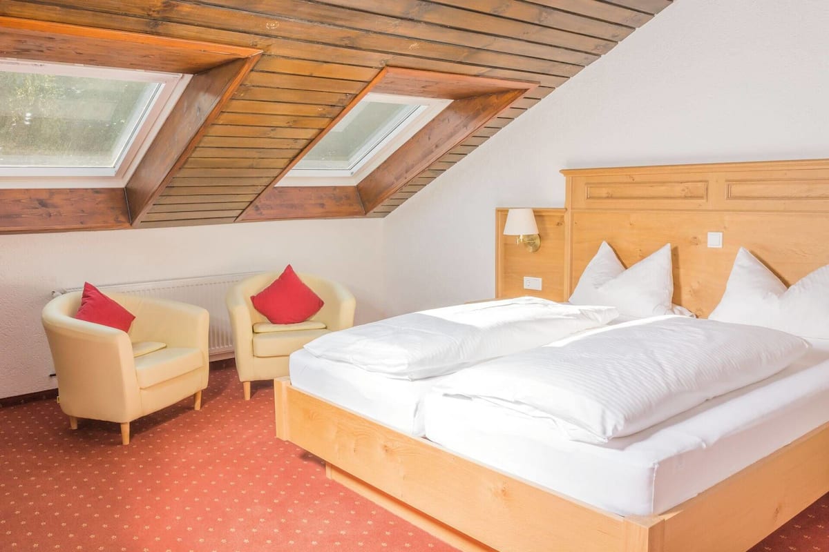 suite, 2 bedrooms | premium bedding, desk, iron/ironing board, free wifi