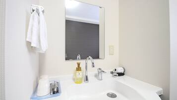 Hair dryer, slippers, electronic bidet, towels