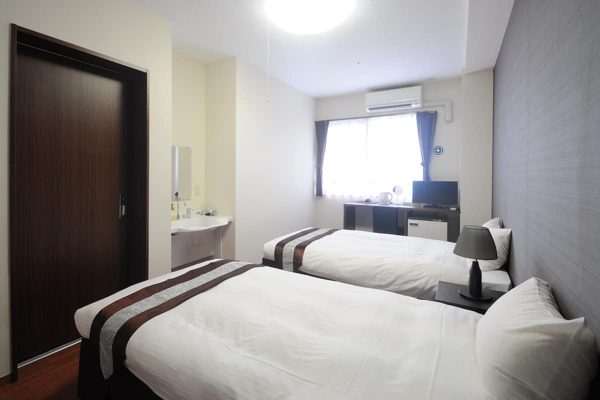 Desk, WiFi (free), bed sheets