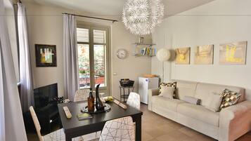 Comfort Apartment | Living area | Flat-screen TV