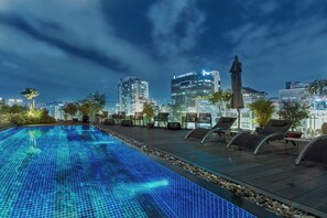 Outdoor pool, open 6:00 AM to 10:00 PM, pool umbrellas, sun loungers - Bach Suites Saigon, a Member of Design Hotels (Ho Chi Minh City)