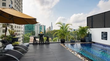 Outdoor pool, open 6:00 AM to 10:00 PM, pool umbrellas, sun loungers