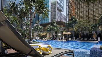 Seasonal outdoor pool, open 8:00 AM to 8:00 PM, pool umbrellas