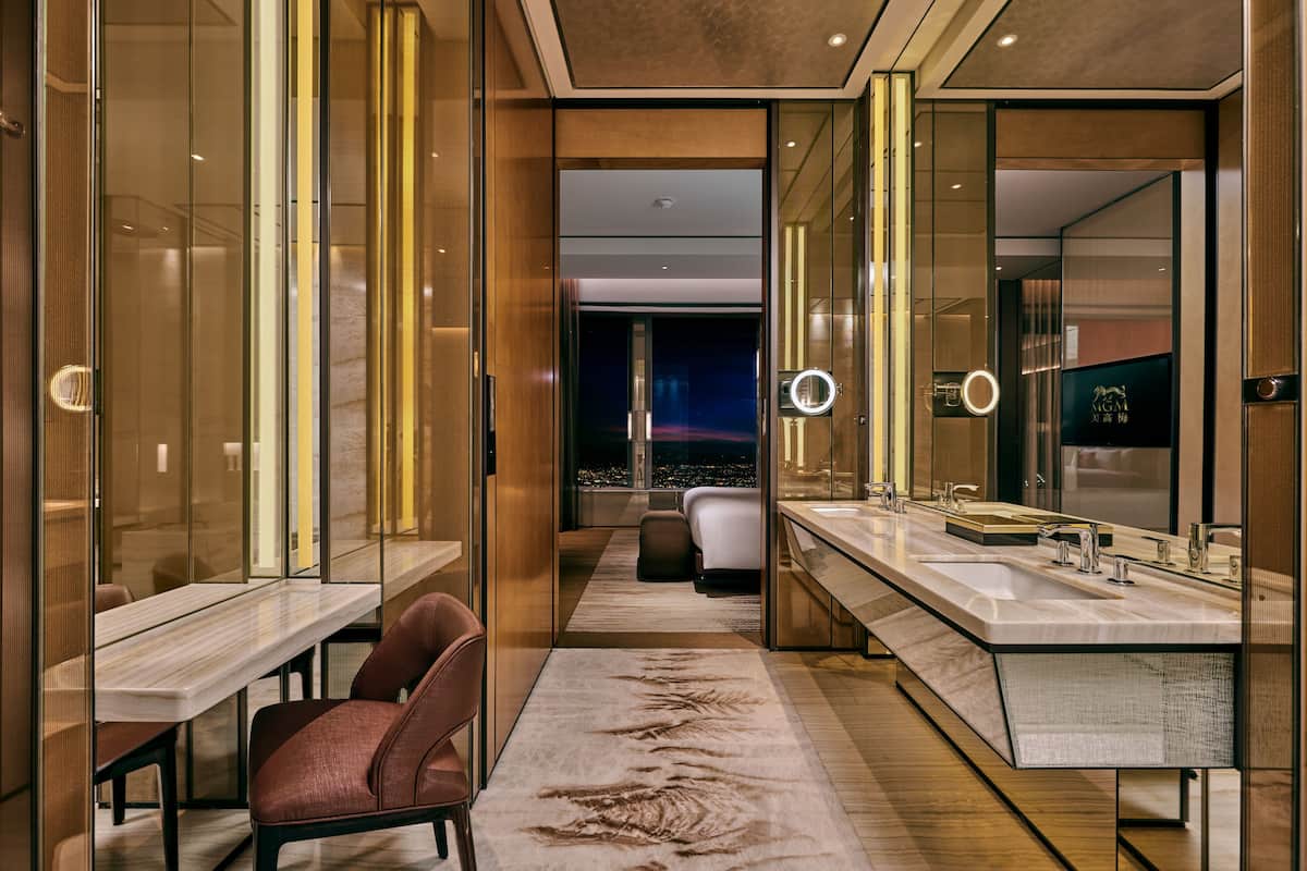 emerald suite | bathroom | separate bathtub and shower, rainfall showerhead, designer toiletries