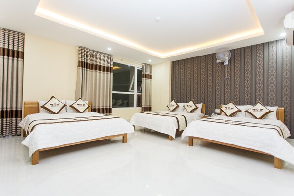 Family Room | Minibar, desk, iron/ironing board, free WiFi - Dam Phuc Hotel (Da Nang)