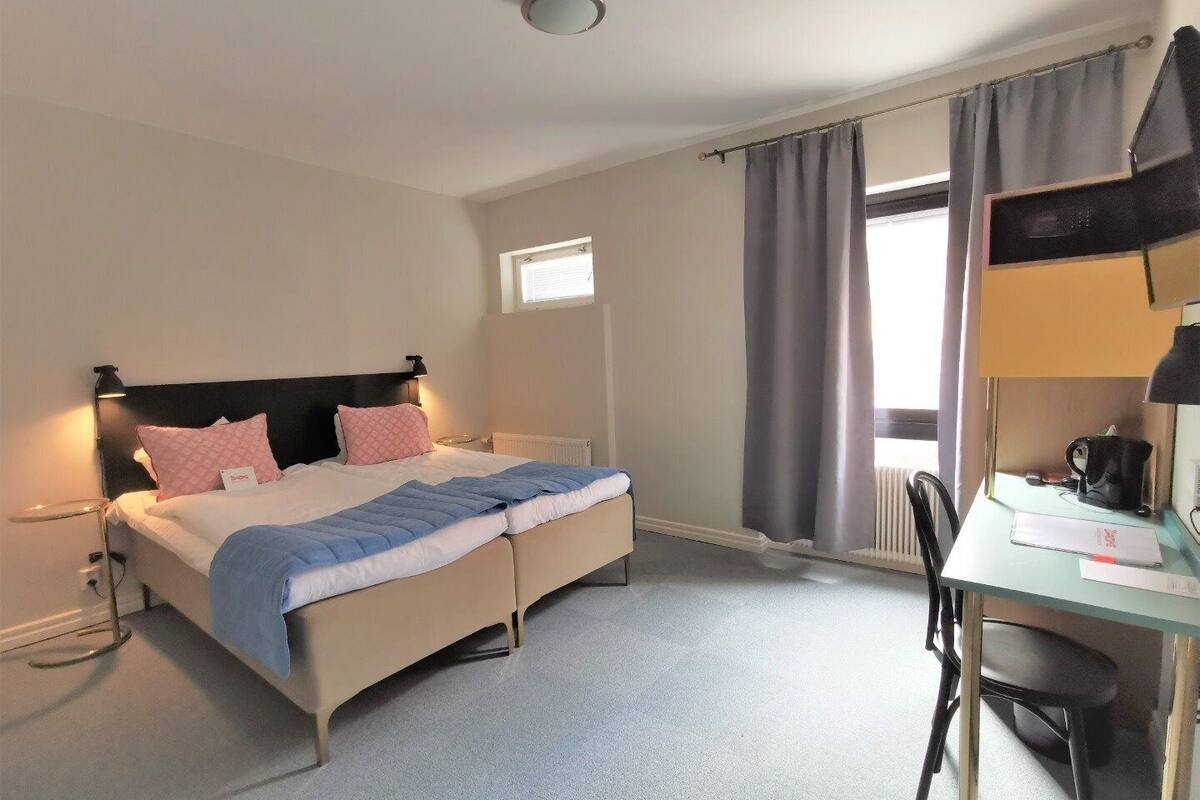 standard twin room, 2 single beds, accessible | in-room safe, desk, laptop workspace, blackout curtains