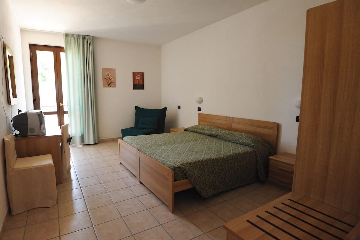 Standard Double Room, Balcony, Mountain View | In-room safe, desk, free WiFi, bed sheets