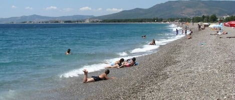 Private beach, sun loungers, beach umbrellas