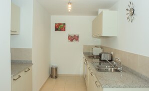 Apartment, 2 Bedrooms, Pool View | Private kitchenette
