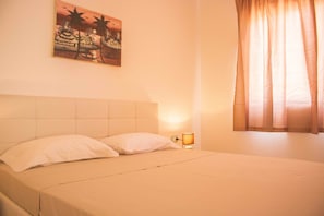 Apartment, 2 Bedrooms, Ocean View | 2 bedrooms, in-room safe, iron/ironing board, free cribs/infant beds