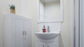 Shower, free toiletries, hair dryer, towels