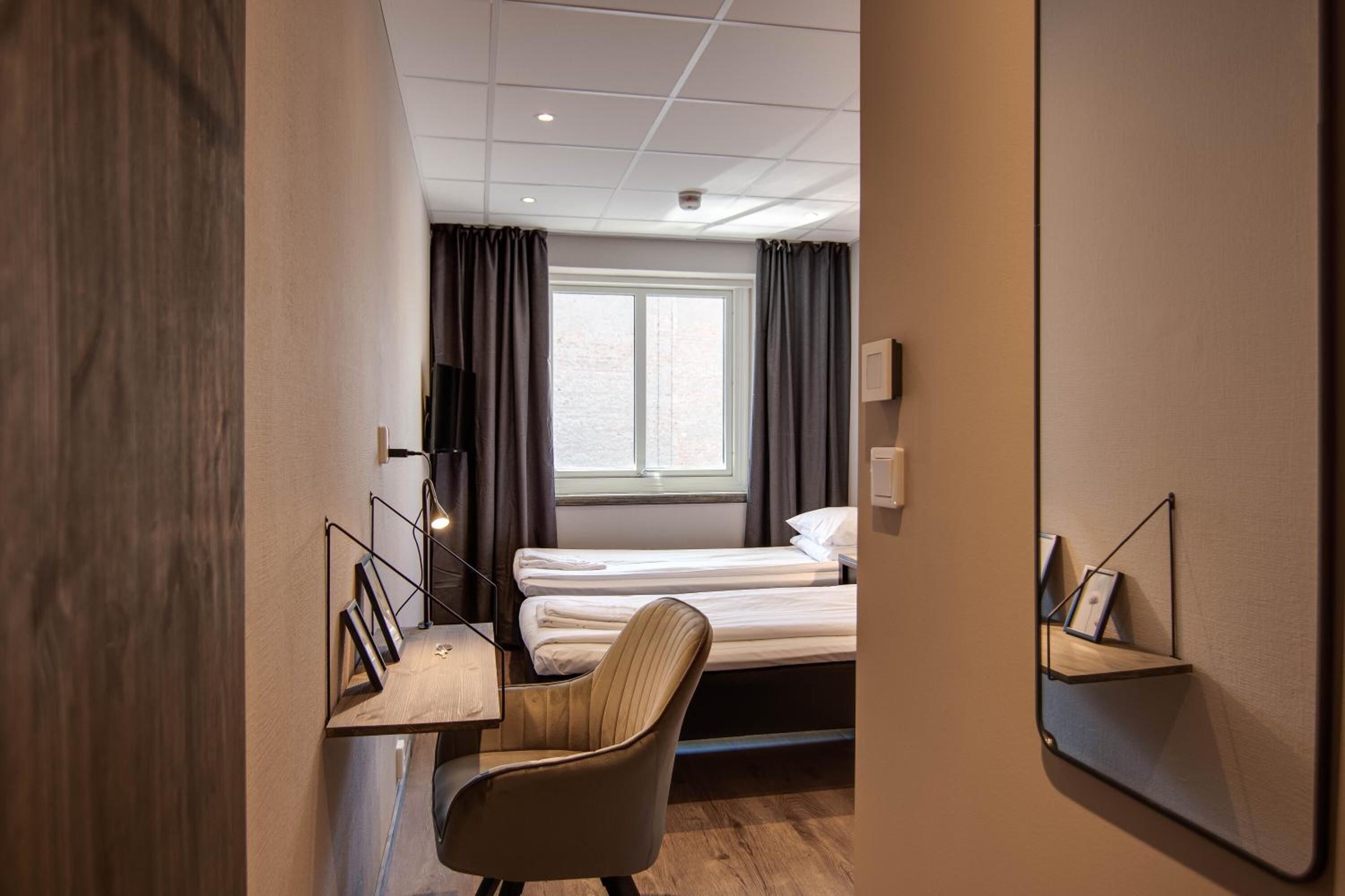 1 bedroom, premium bedding, blackout curtains, soundproofing