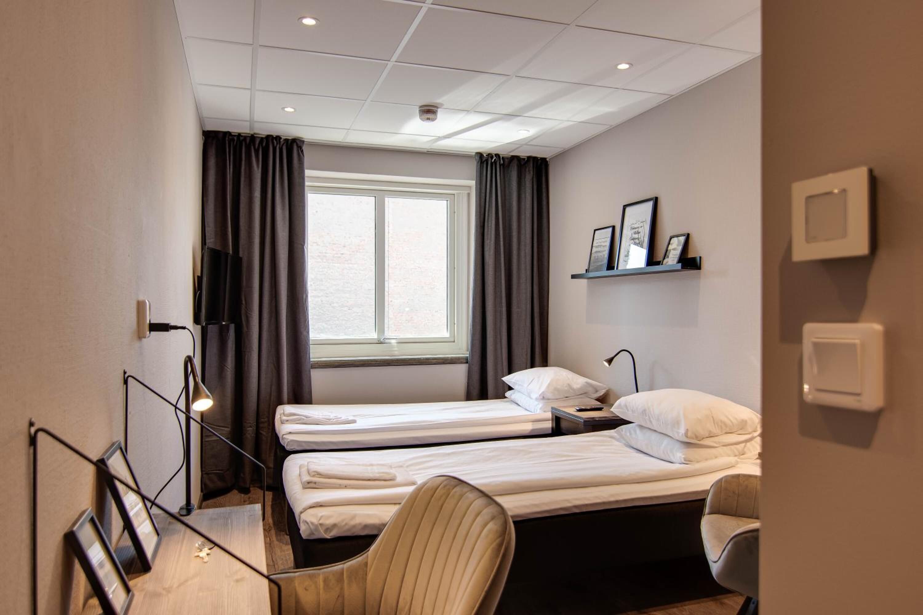 1 bedroom, premium bedding, blackout curtains, soundproofing