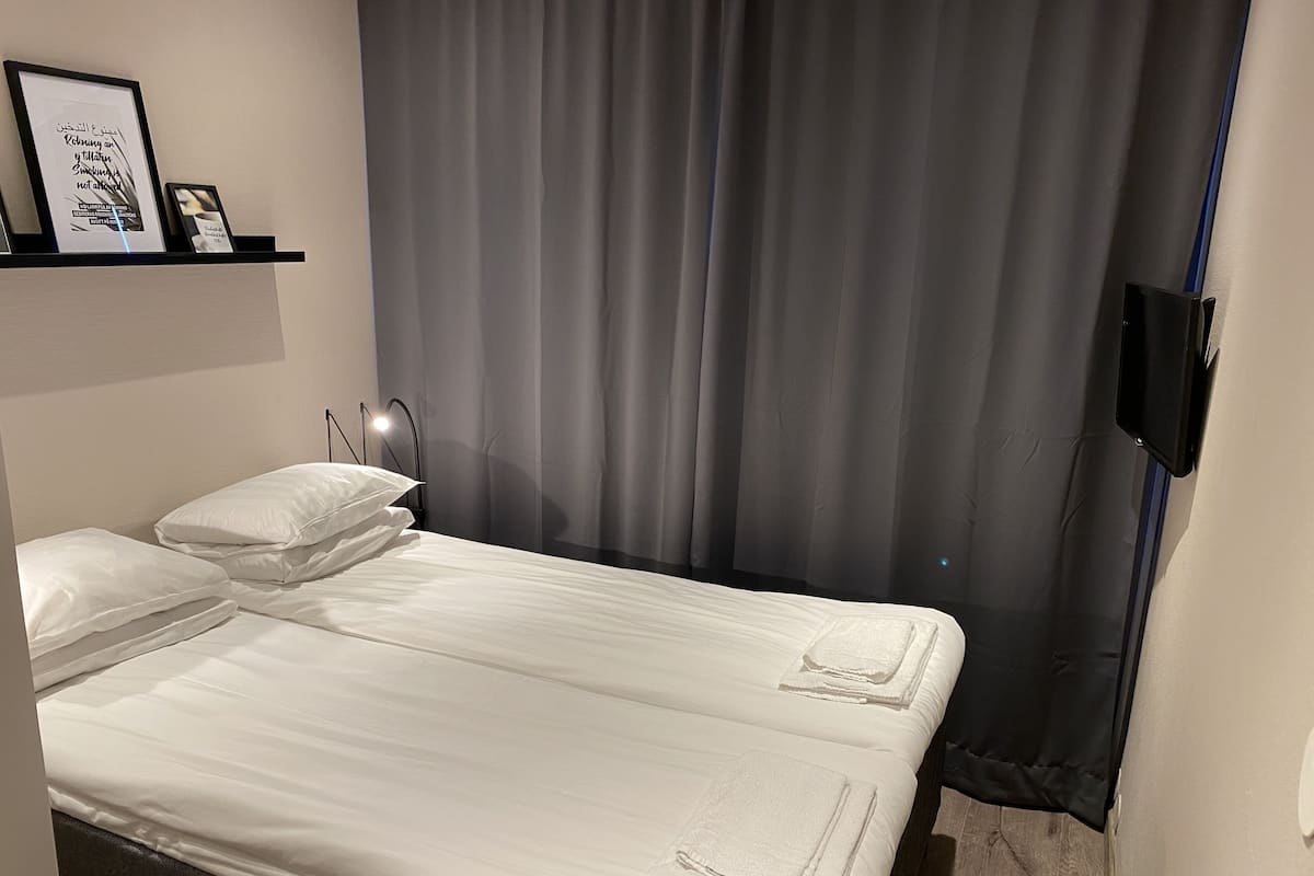 1 habitación, ropa de cama de alta calidad y cortinas blackout