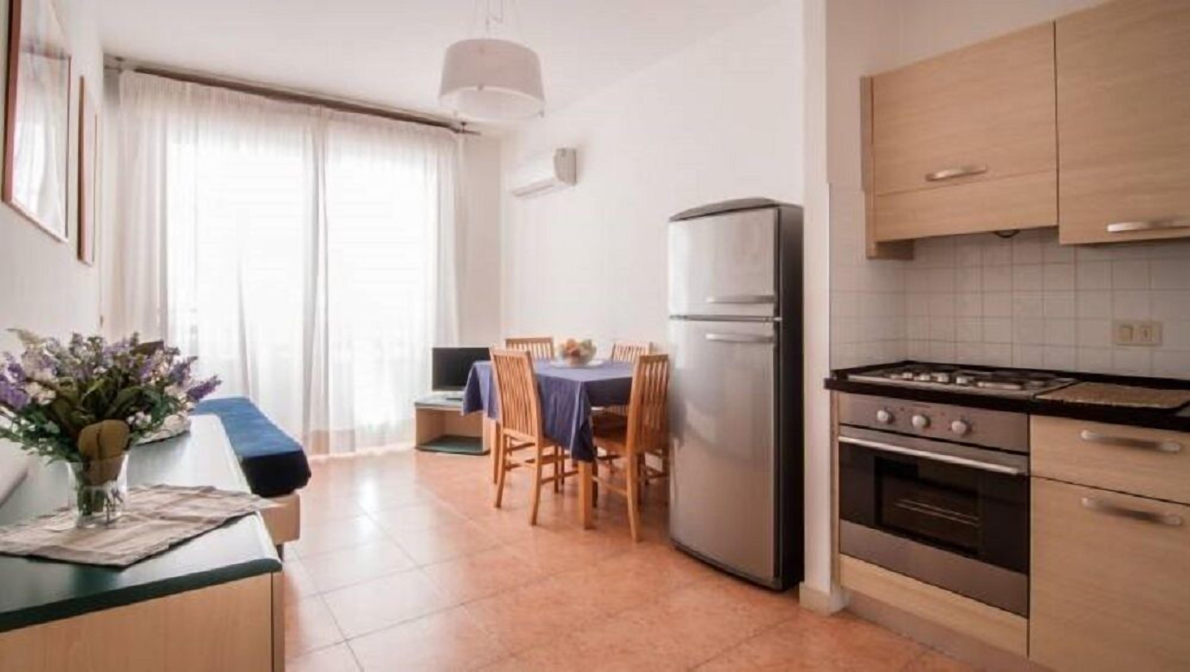 Apartment, 1 Bedroom, Balcony, Sea View | Private kitchen | Full-sized fridge, oven, stovetop, cookware/dishes/utensils