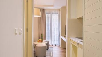 Deluxe Studio | Ruang tamu | TV skrin rata