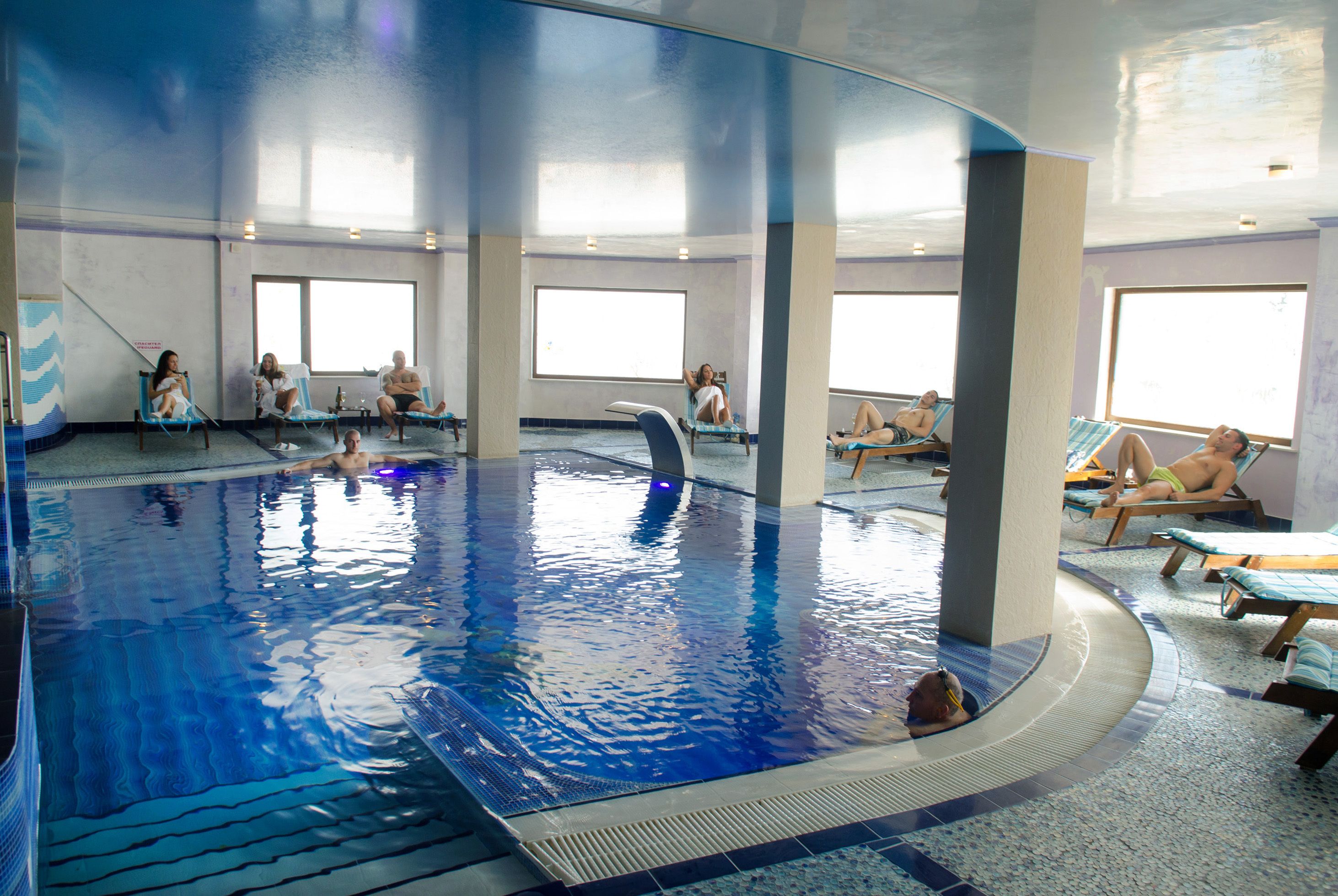 indoor pool, pool loungers