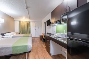 Blackout drapes, iron/ironing board, free WiFi, bed sheets