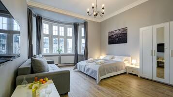 Studio (with shower, 4 people ) | 1 bedroom, individually furnished, iron/ironing board, cribs/infant beds