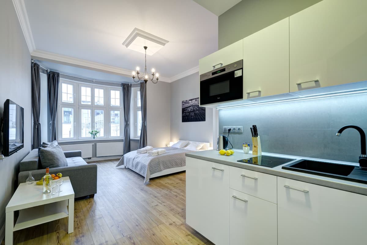 Studio (with shower, 4 people ) | 1 bedroom, individually furnished, iron/ironing board, cribs/infant beds