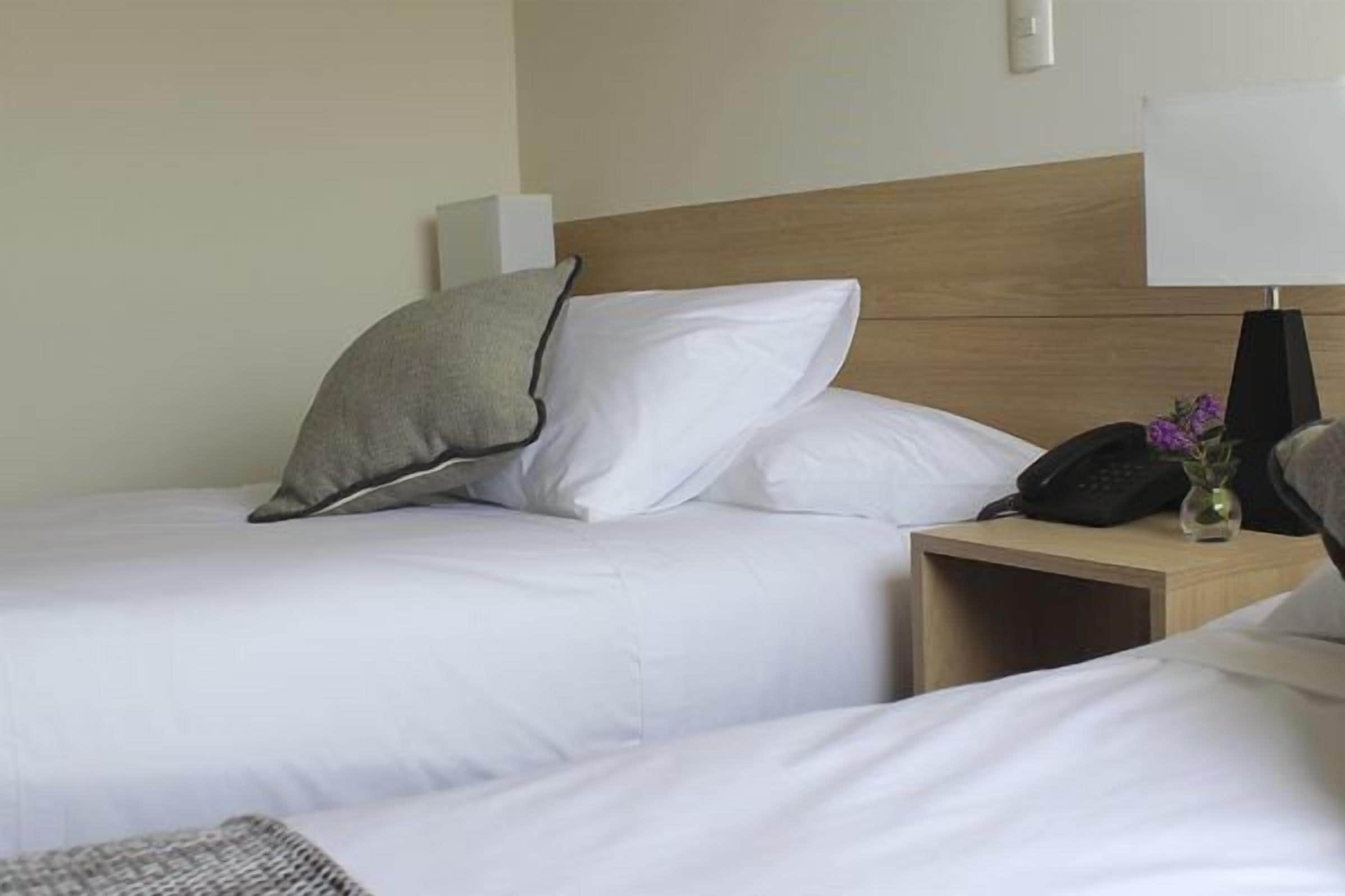 standard twin room, 2 single beds | in-room safe, desk, free cots/infant beds, free rollaway beds