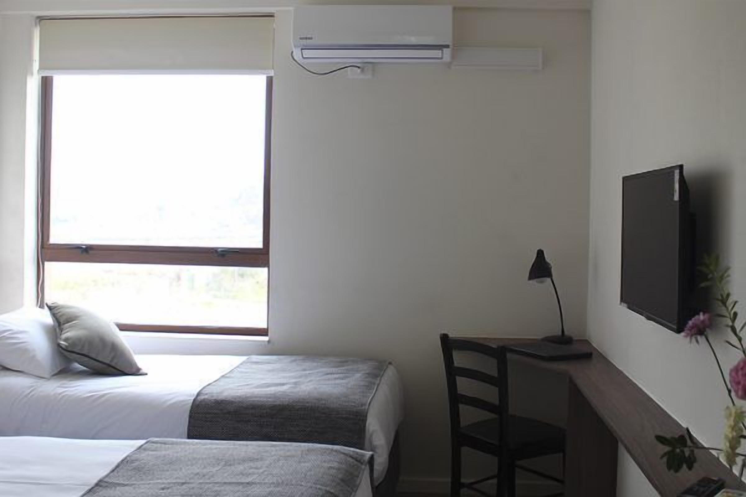 standard twin room, 2 single beds | in-room safe, desk, free cots/infant beds, free rollaway beds