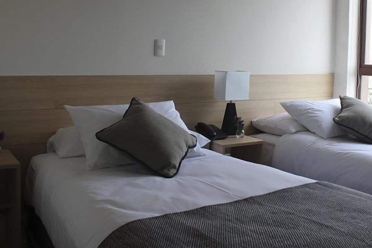 standard twin room, 2 single beds | in-room safe, desk, free cots/infant beds, free rollaway beds