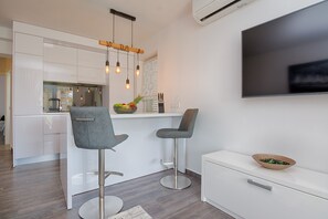 Apartment, 2 Bedrooms, Sea View (A2) | Private kitchen | Fridge, microwave, stovetop, coffee/tea maker