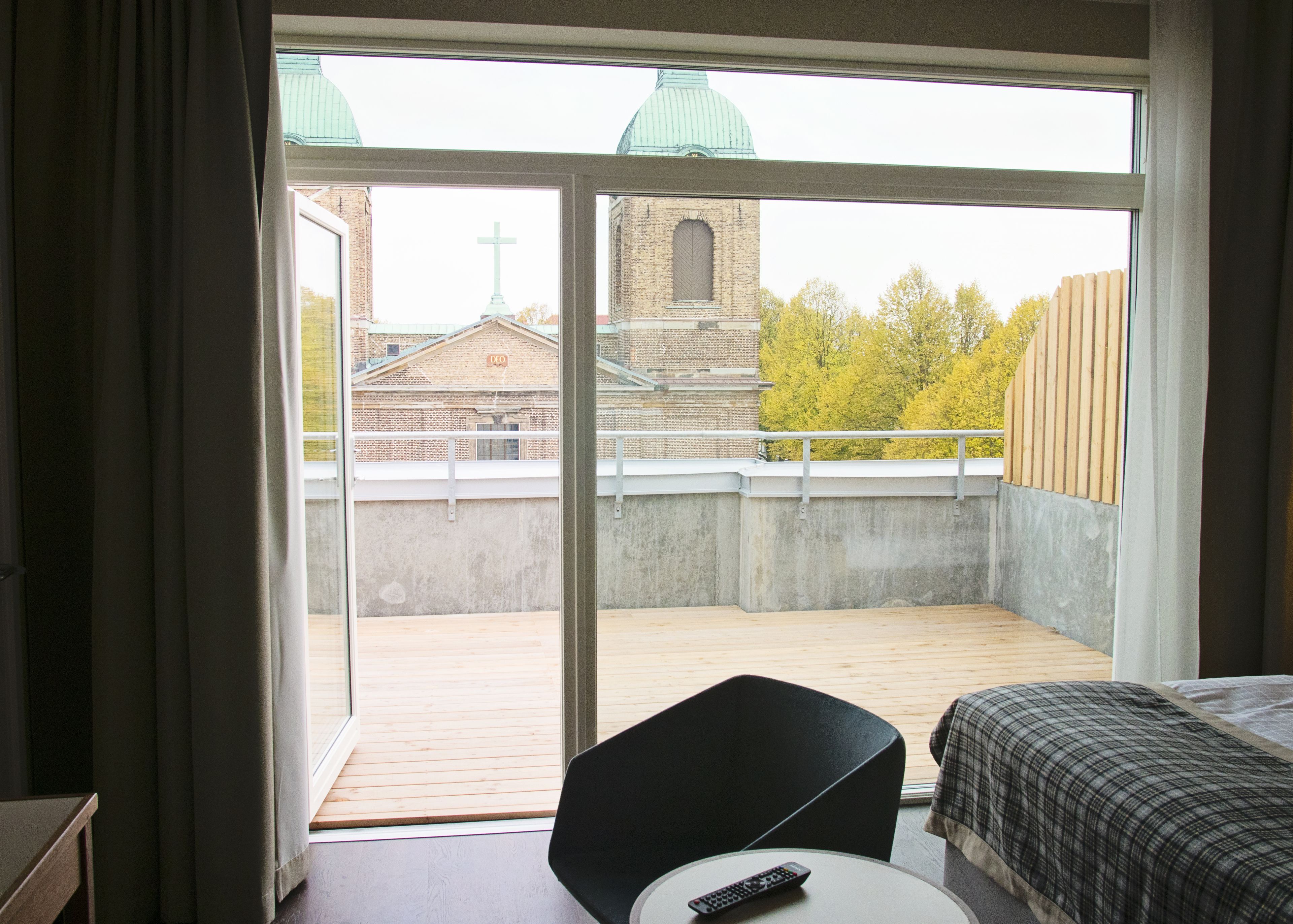 junior suite | in-room safe, blackout curtains, iron/ironing board, free wifi