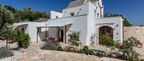 Apartamento família, vista para o jardim (Il Melograno) | Fachada