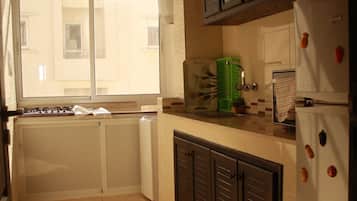 Apartamento, 2 habitaciones | Cocina privada | Frigorífico, microondas, horno y placa de cocina