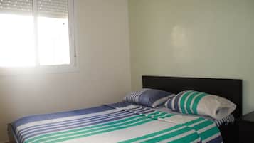 2 dormitorios, cortinas opacas, wifi gratis y ropa de cama