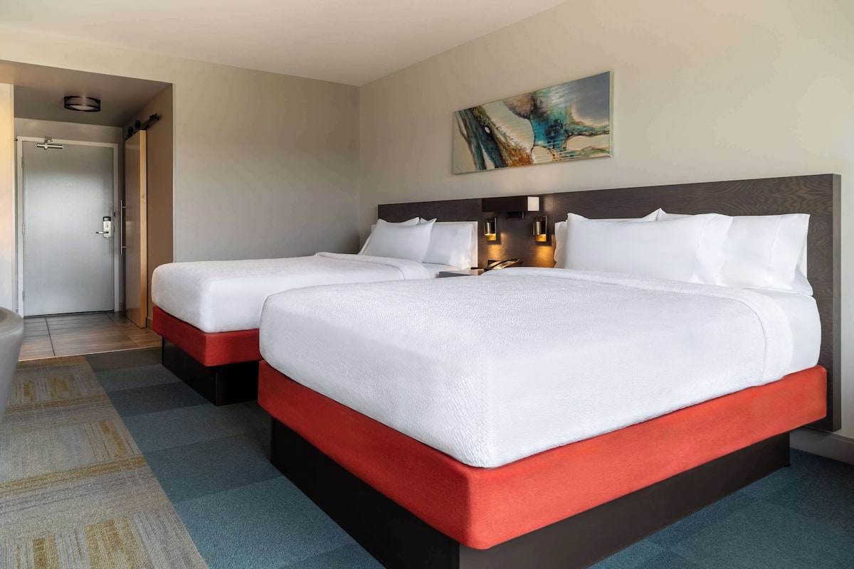 Premium bedding, down comforters, pillowtop beds, in-room safe