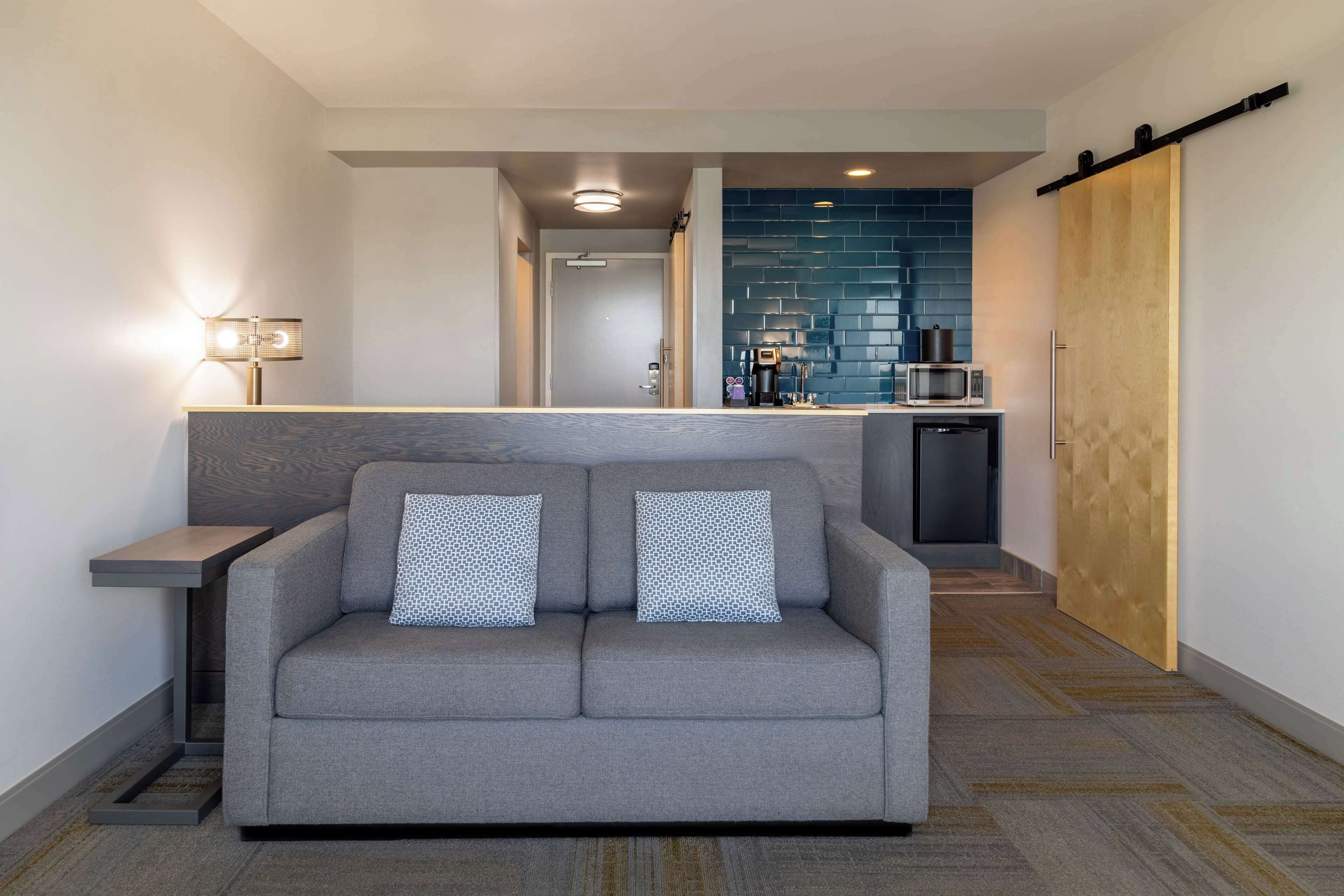 suite, 1 bedroom (1 king bed) | living area | 55-inch tv with cable channels, pay films