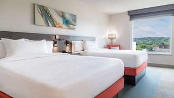 Premium bedding, down comforters, pillowtop beds, in-room safe