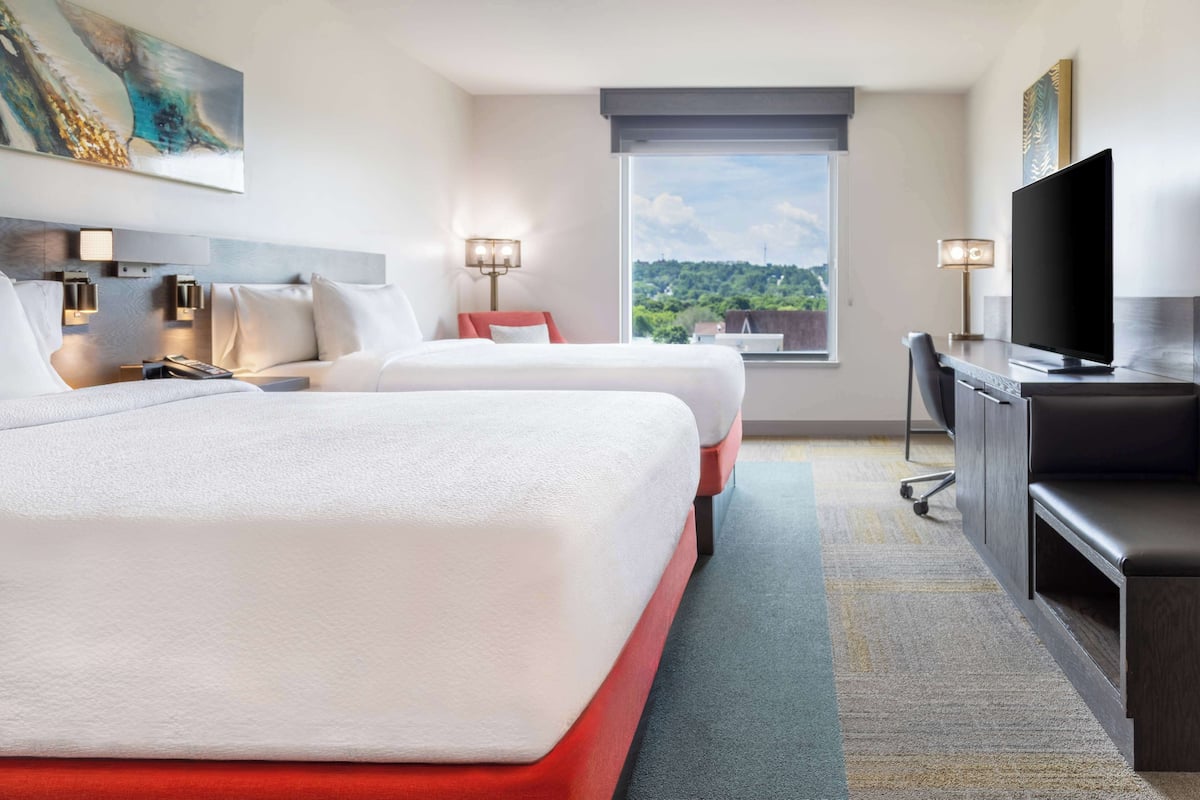 premium bedding, down duvets, pillow-top beds, in-room safe