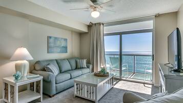 Condo, 1 Bedroom, Beach View | Living room | Flat-screen TV, DVD player