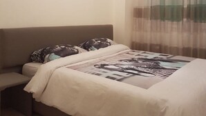 2 habitaciones, cortinas blackout y tabla de planchar con plancha 