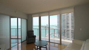 Apartment (Breathtaking Views) | Living area | Flat-screen TV