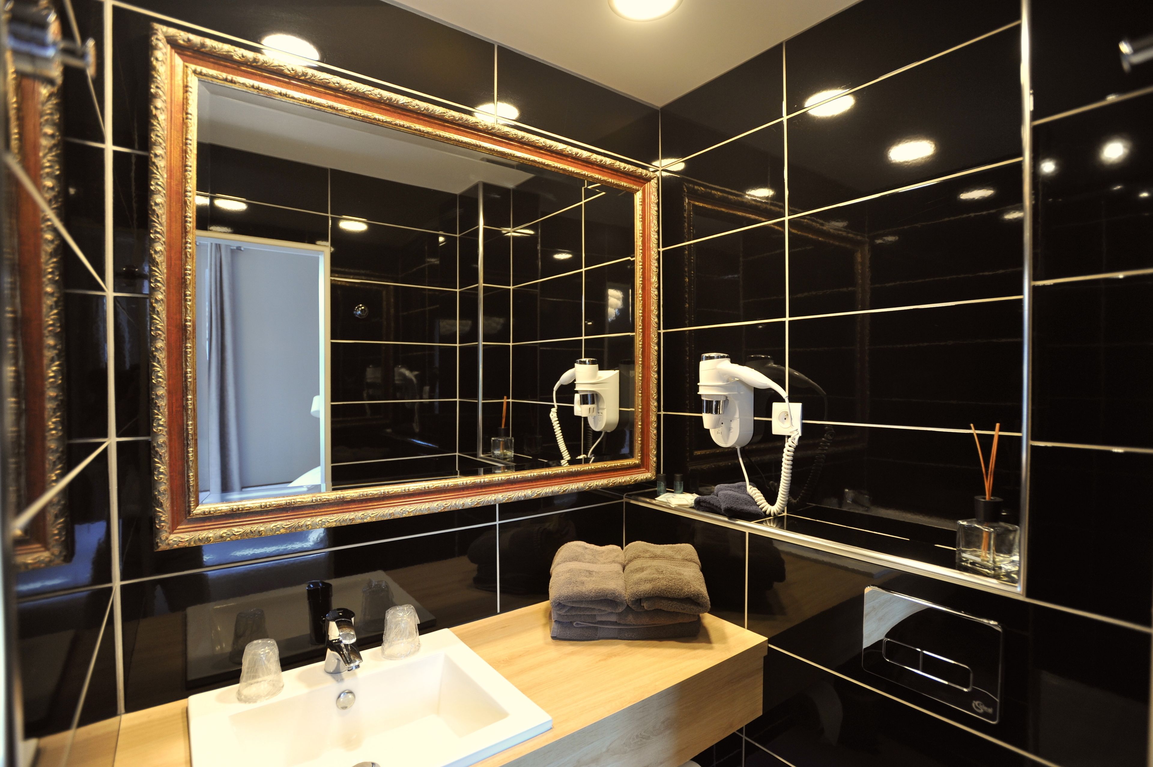 classic double room | bathroom | shower, hair dryer, towels